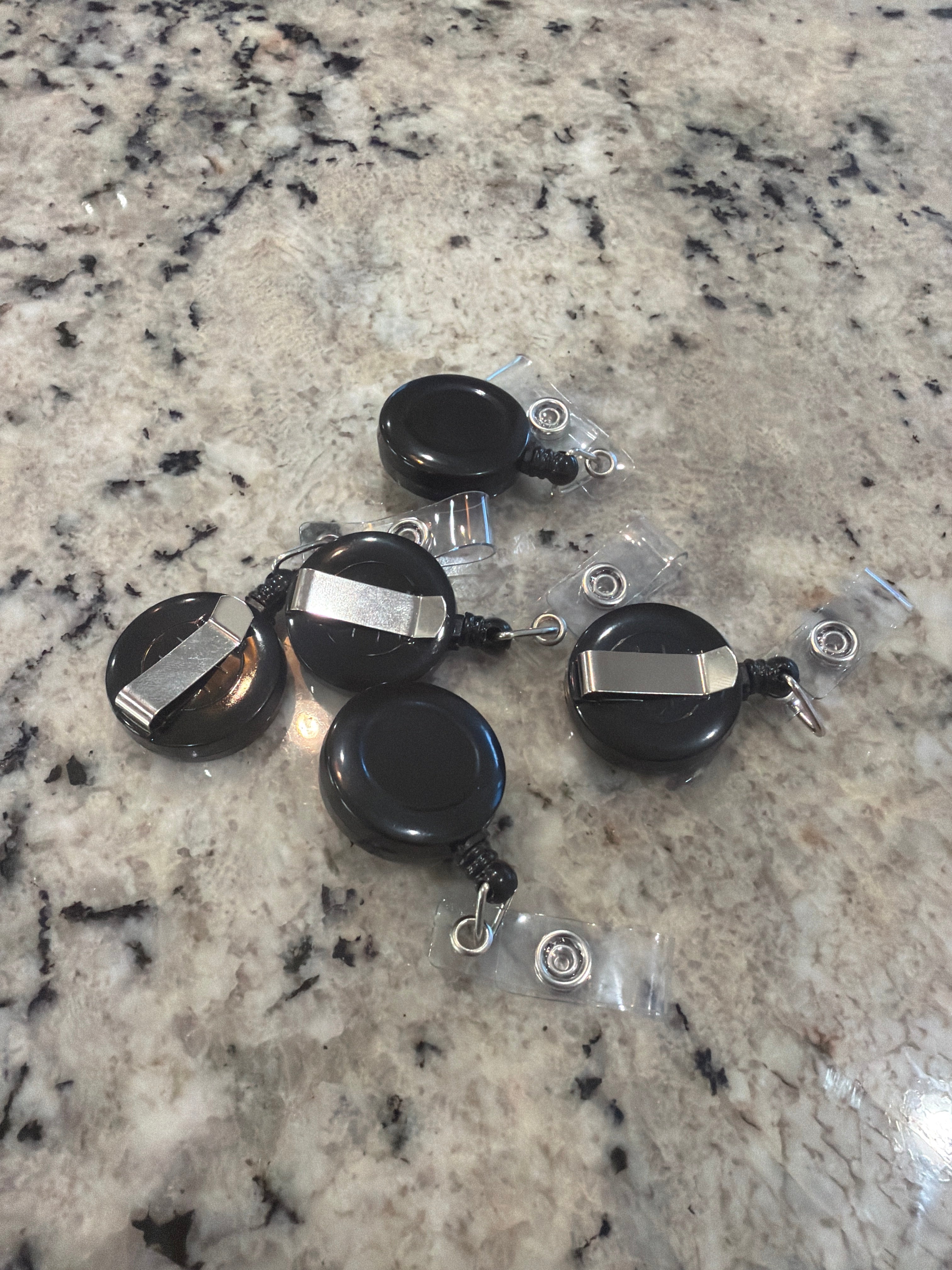 Retractable key holder with pant clip
